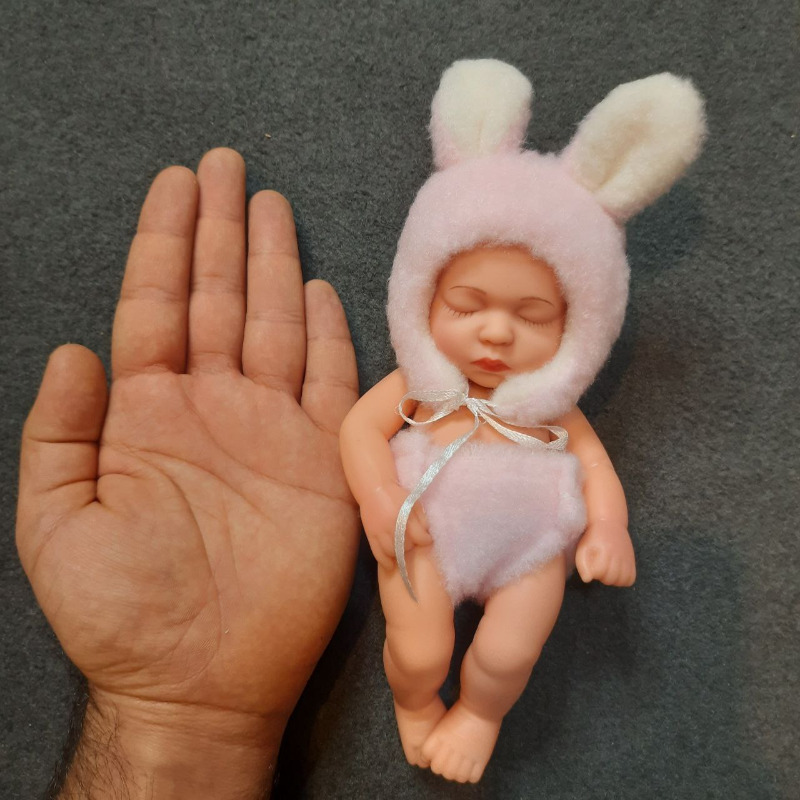 عروسک سیلیکونی وینیل واقعی ۱۹ سانتی با لباس یاسی رنگ