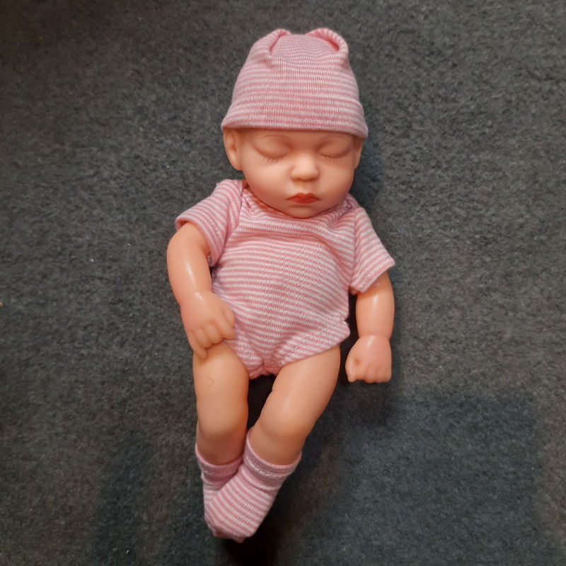 عروسک سیلیکونی وینیل واقعی ۱۹ سانتی با لباس صورتی رنگ راه راه