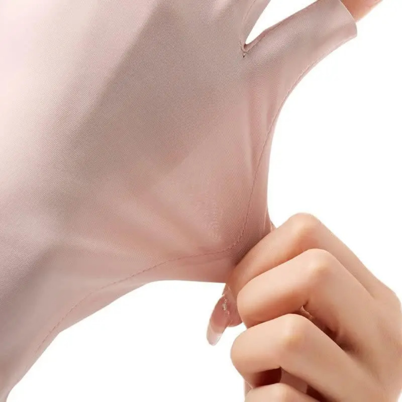 دستکش  ضد برنزه شدن UV Protection Gloves مخصوص مانیکور با +UPF50 صورتی رنگ، محافظ پوست دست در برابر اشعه‌های مضر خورشید در زمان کاشت ناخن، ژل، لاک ژل و کار با دستگاه UV/LED Image