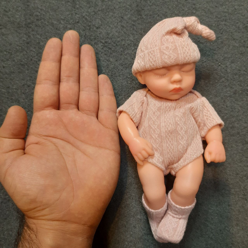 عروسک سیلیکونی وینیل واقعی ۱۹ سانتی با لباس گلبهی رنگ