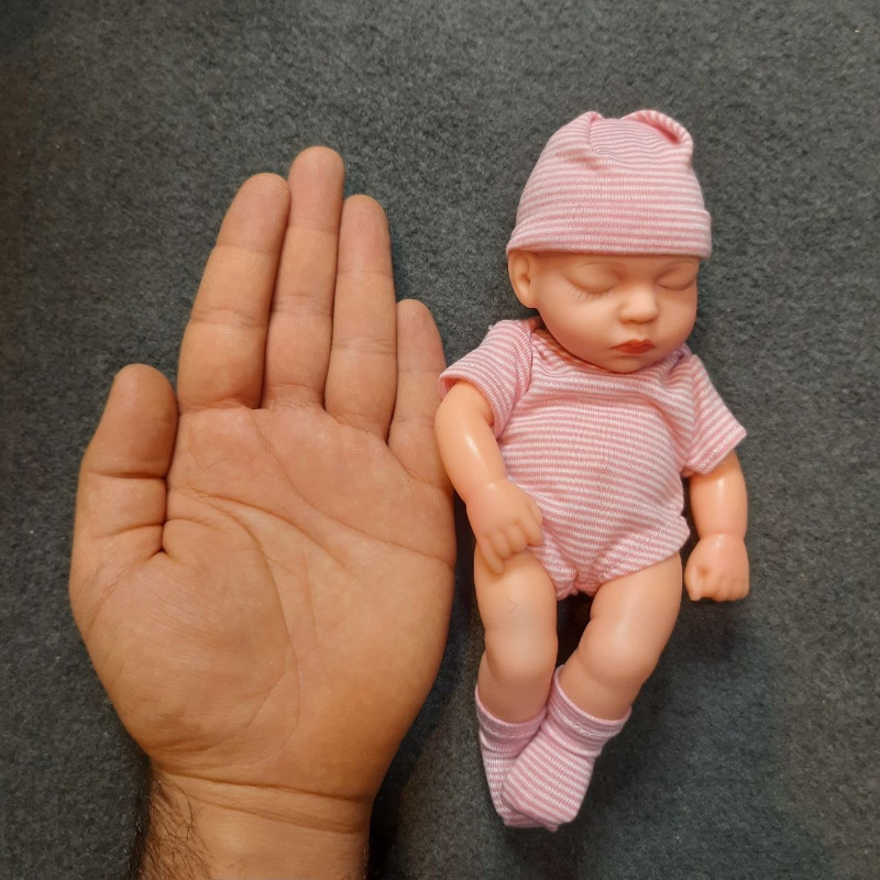 عروسک سیلیکونی وینیل واقعی ۱۹ سانتی با لباس صورتی رنگ راه راه