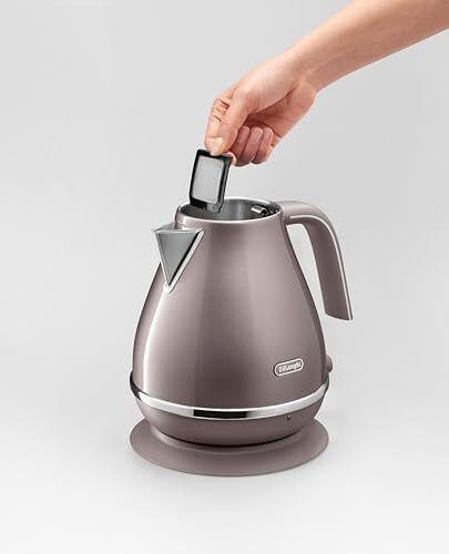 کتری استیل De'Longhi مدل 0210110165 Icona Metallics KBOT3001.PK، به ابعاد 275mm x 190mm x 240mm، رنگ صورتی/بنفش Image