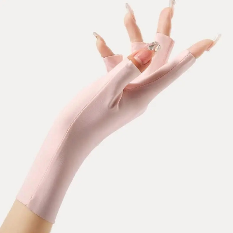 دستکش  ضد برنزه شدن UV Protection Gloves مخصوص مانیکور با +UPF50 صورتی رنگ، محافظ پوست دست در برابر اشعه‌های مضر خورشید در زمان کاشت ناخن، ژل، لاک ژل و کار با دستگاه UV/LED Image