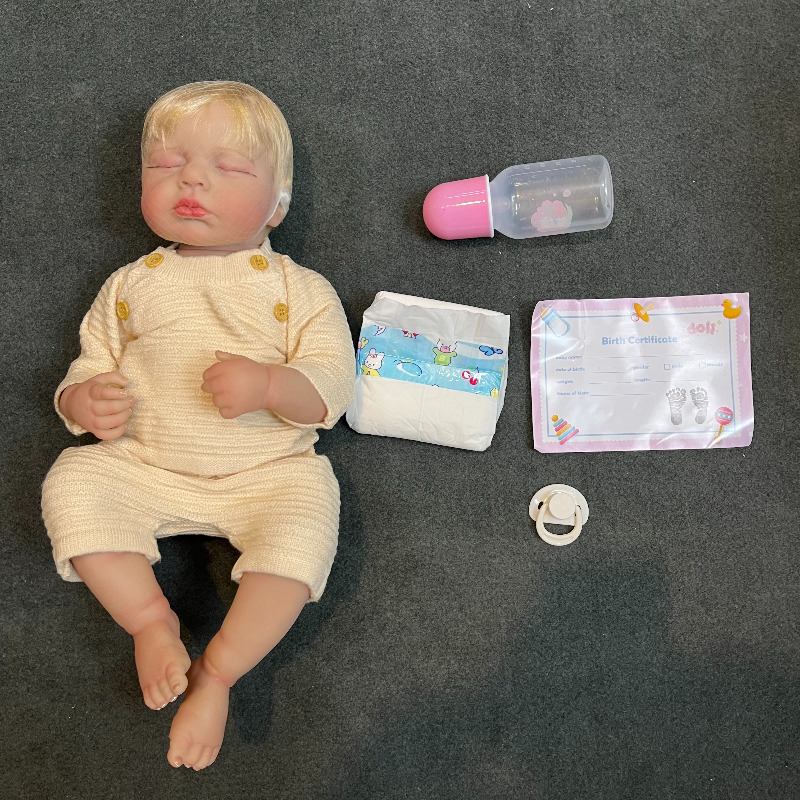 عروسک سیلیکونی نوزاد ریبورن reborn وینیل واقعی 17 اینچی(43 سانتیمتر)با لباس زرد رنگ و موهای زرد و لوازم جانبی برای سن +۳ Image